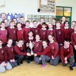 All-Ireland Credit Union Quiz champions Eoghan Quinn, Thomas Cannon, Ronan McGinley and Eilish Russell, Scoil Cholmcille, Kilmacrennan, winners out of 5500 teams in the u13 category with their classmates. Photo: Donna El Assaad