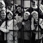 Children smile for the camera during a visit to the county by former president Mary McAleese in 1998.