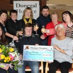 Benny Porter, Drumoghill winner of the Jackpot in the Donegal Hospice Highland Radio Bingo pictured at the Donegal Hospice today as he receives his cheque for 10,000 Euros. Included seated are from left are Marian Potts representing Highland Radio Benny Porter, winner of the Highland Bingo Jackpot and Grace Boyle Hospice Chairperson. back row form left are Geraldine Casey, Cristeen Porter, Kathleen Harkin Derek Mc Elhinney representing McElhinney's XL Manorcunningham. Una Mc Glynn and Caroline O'Conner Photo Brian McDaid