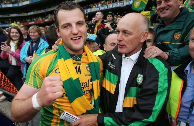 Michael Murphy is congratulated by Anthony Molloy after the All-Ireland final. They will be in opposition camps tomorrow.
