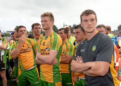 A dejected Ryan Bradley, Ross Wherity and Leo McLoone, Donegal, at the end of the game