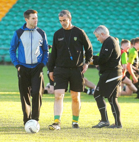 Rory Gallagher, Jim McGuinness and Pat Shovelin having a chat at training before the Ulster final. 