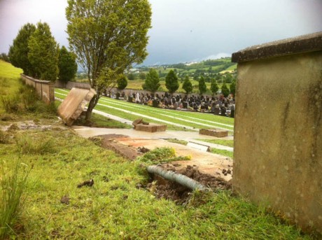 A wall collapsed at Conwal Cemetery, Letterkenny, following flash flooding in the area.