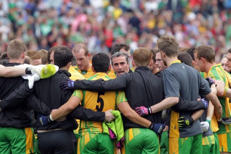 Donegal manager Jim McGuinness speaking to his squad before throw-in. Photo: Donna McBride