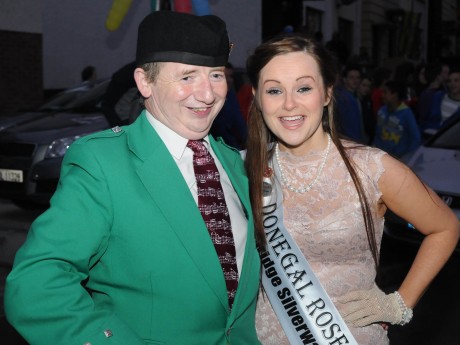 The Donegal Piper Christy Murray pictured with Donegal Rose Catherine McCarron at the homecoming in Raphoe on Friday night. Christy had led the parade as Catherine was brought through the town to St Eunan’s Terrace.