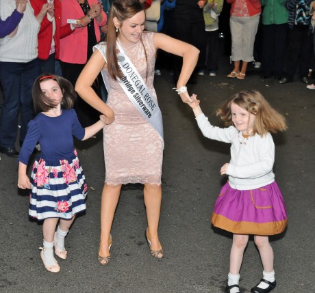 Donegal Rose Catherine McCarron dancing with her nieces Hannah and Ella at the special homecoming in her honour in Raphoe on Friday night.