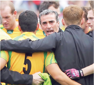 Donegal manager Jim McGuinness speaking to his squad before throw-in.