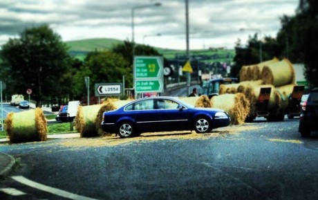 A hay load falls off a trailor at Lifford Roundabout.