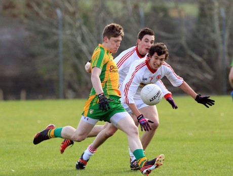 David McCarron of Donegal in action against Maurice McCloughan of Tyrone. Photo: Donna McBride