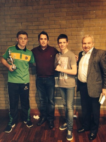 Donegal News Sports Writer Chris McNulty who presented some of the prizes at the tournament, with boxers Brett McGinty and Callum Toland. Also included is Donegal Boxing Board PRO Peter O'Donnell.