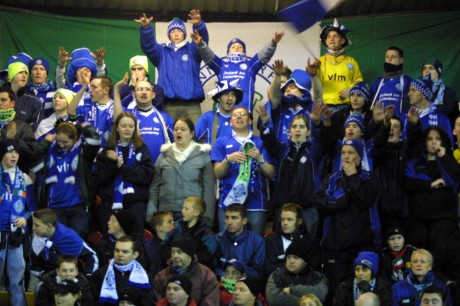 Finn Harps fans in full voice at the Brandywell in 2003. Panelists Shaun McGowan, Chris Breen and Martin Ferry are included. Behind McGowan, on the right, is Donegal News sports reporter Chris McNulty.