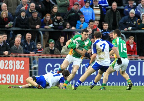 Ciaran Bonner of Glenswily in possession against Ballinderry. Photo: Donna McBride