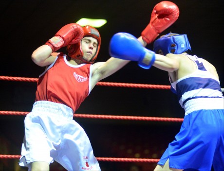  Liam Callaghan, Cardonagh (red) v Brendan Irvine, St Pauls (blue) winner,  in the 49kg at the National Open Youth Championships final at the National Stadium. 