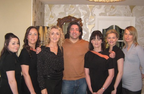 Brian Kennedy with Mary Ferry (third from left) and her team at the Genesis Skincare & Laser Clinic.