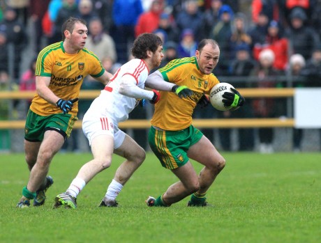 Colm McFadden in possession against Ronan McNamee of Tyrone.