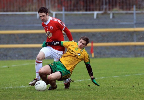 Darach O'Connor is fouled by Tyrone 'keeper Niall Morgan for a penalty in the first half.