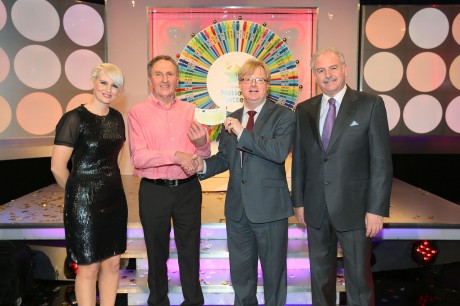 Pictured at the presentation of winning cheques were, from left to right: Sinead Kennedy, game show co-host; Frank McDaid, the winning player; Eddie Banville, Head of Marketing, The National Lottery and Marty Whelan, game show co-host. The winning ticket was bought from EuroSpar, Newtowncunningham, Picture: Mac Innes Photography
