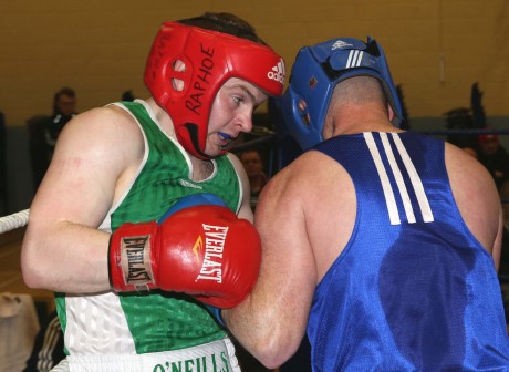 Ryan Mc Cullagh of Raphoe BC in action against James Bonner of Dungloe BC.