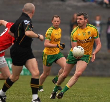 Christy Toye looks for a colleague as he wins posession, in the league game in Ballyshannon.
