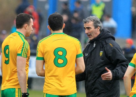 Donegal manager Jim McGuinness giving instructions to midfielders Martin McElhinney (9) and Rory Kavanagh (8) before the Monaghan match in O'Donnell Park. Photo: Donna El Assaad