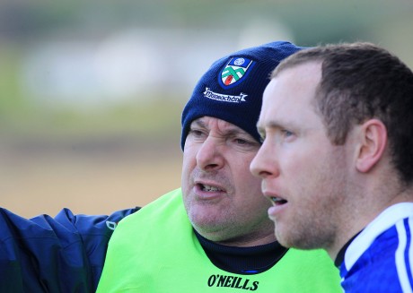 Malachy O'Rourke, Monaghan manager gives instructions to his substitute Vinny Corey.