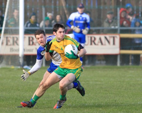 Ryan McHugh, Donegal in action against Ryan Wylie of Monaghan.