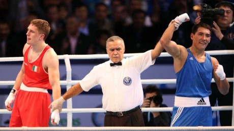Jason Quigley after his defeat to Zhanibek Alimkhanuly (right)