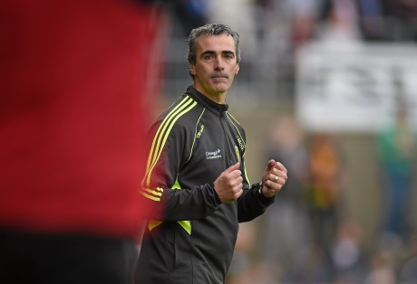  Donegal manager Jim McGuinness clenches his fists in celebration at the final whistle. 