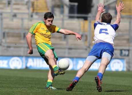 Dessie Mone, Monaghan attepts to block the pass by Donegal's Mark McHugh. Photo: Donna El Assaad