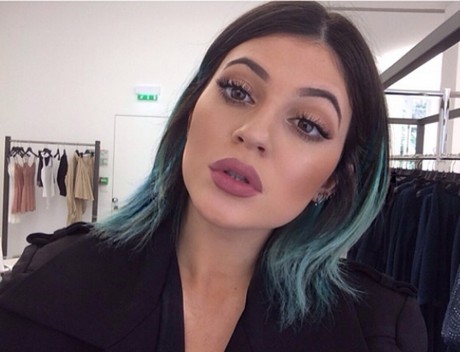 Kylie Jenner shows off her blue hair.