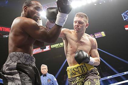 Jason Quigley lets fly against Howard Reece