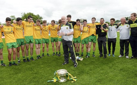 Declan Bonner, Donegal minor manager, addresses his players after the Ulster final.