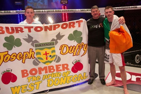 The Burtonport Bomber, Joseph Duffy with family following his win. Photos: Copyright Dolly Clew/ Cage Warriors