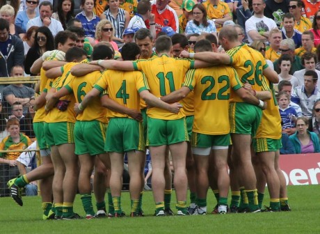 The Donegal squad in a huddle before the Ulster final. Photo: Gary Foy