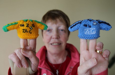 Grainne Shiels with her knitted bottle top hats.