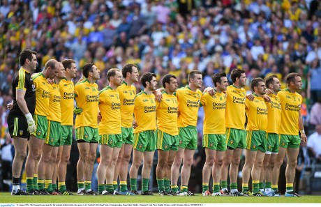 The Donegal team stand for the national anthem before the game against Dublin