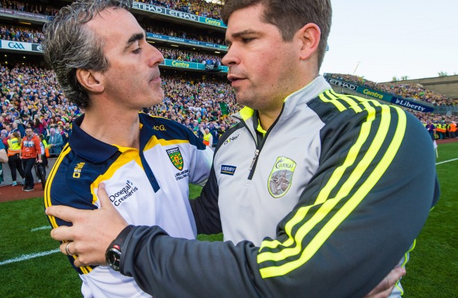 Jim McGuinness with Eamonn Fitzmaurice after the 2014 all-Ireland Final