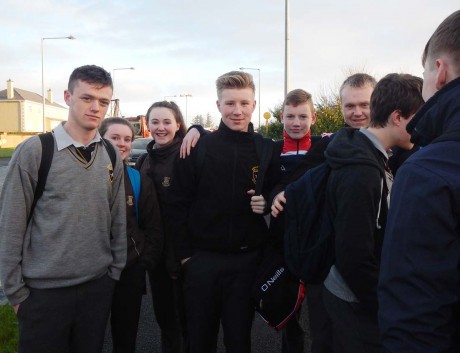 Some of the students who were evacuated from the burning bus.