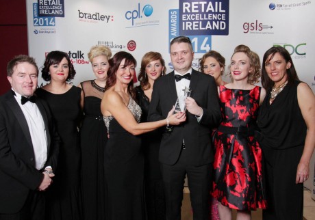 Mr Peter Sweeney of Barclaycard (event sponsors) and Ms Oonagh O’Hagan chairperson of Retail Excellence Ireland with Martin McElhinney and his team from McElhinney’s of Ballybofey at the Retail Excellence Ireland Awards 2014.  Photo:- Andrew Downes Photography.
