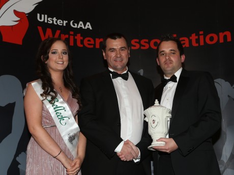 UGAAWA member Chris McNulty presents the Personality of the Year Award to Donegal county chairman Sean Dunnion who accepts it on behalf of Donegal manager Jim McGuinness while included is Maeve of trophy sponsors Belleek Pottery.  Pic by John McIlwaine