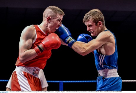 Noel McBride, Corrib, left, exchanges punches with Sean Hunt, Palmerstown, during their 67kg bout. 