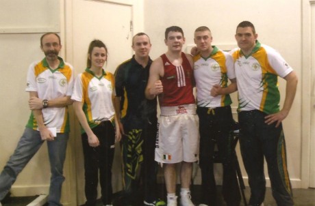 Paul Kelly, Twin Towns Boxing Club, with his coaches and team-mates after winning his semi final