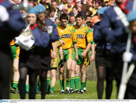 Rory Kavanagh and Christy Toye in the pre-match parade ahead of the Ulster Senior Football Championship game against Armagh in Sean MacCumhaill Park back in 2007. Picture: Oliver McVeigh / SPORTSFILE