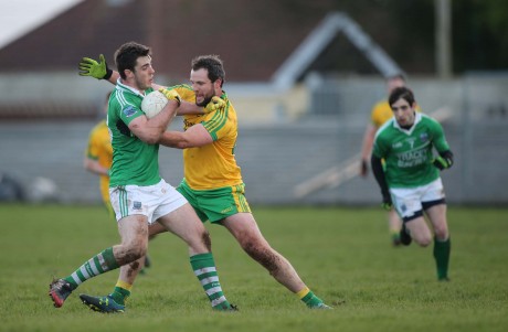 Donegal's Michael Murphy gets to grips with Fermanagh's Ryan Jones.