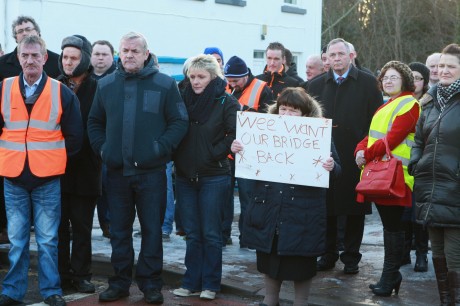 Mary Campbell with other protesters, as they assembled on Main Street, Glenties, yesterday afternoon. Photo: Brian McDaid
