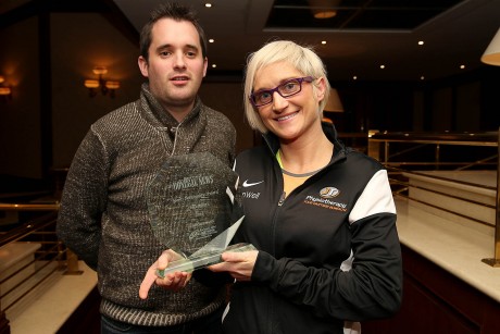 Ann Marie McGlynn receiving the Donegal News Sports Personality of the Month award for December 2014 from Chris McNulty, Donegal News.
