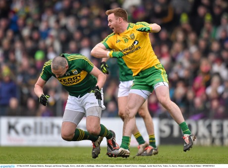 Eamonn Doherty, Donegal, and Kieran Donaghy, Kerry, clash after a challenge. 