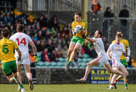 Martin McElhinney, Donegal, in action against Ronan McNabb, Tyrone.