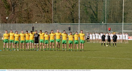  The Donegal and Tyrone teams stand for the national Anthem. 