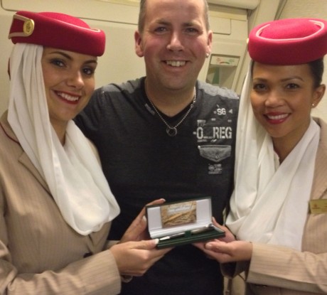 Denis Sweeney with Emirates cabin crew Katy McGee, who has Donegal connections, and Helen Estrada from the Philippines.